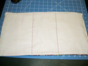 Sew two lines to devide cloth into three parts
